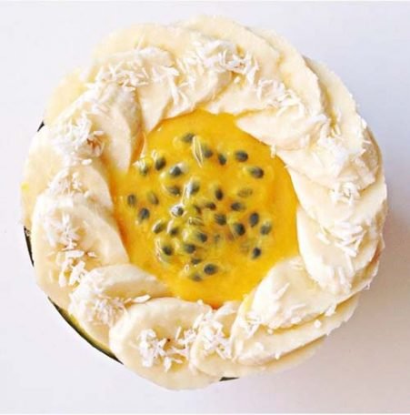 the-carousel-vegan-Mango-sorbet-(2-frozen-bananas-blended-with-2-fresh-mangoes)-topped-with-passionfruit,-banana-and-shredded-coconut