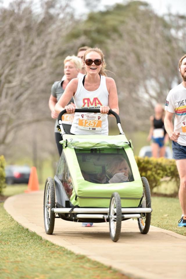 Jena running with her two kids