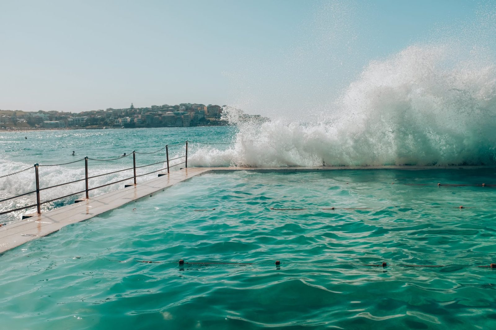 sea waves crashing on swimming pool