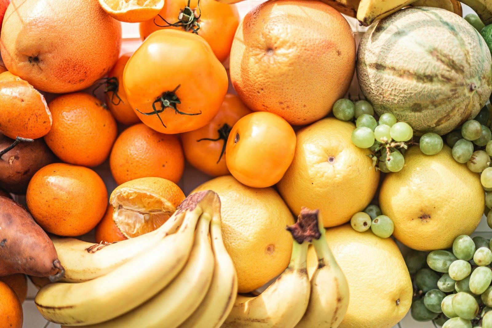 assorted fresh juicy fruits on table