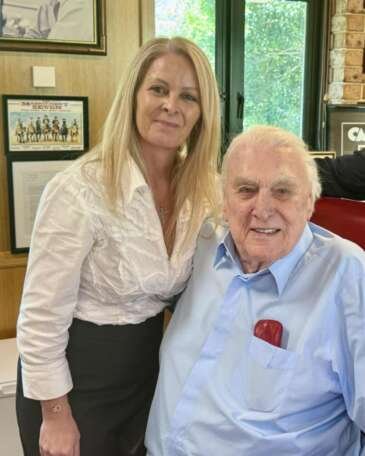 Super Radio Network co-owner Despina Priala and John Laws